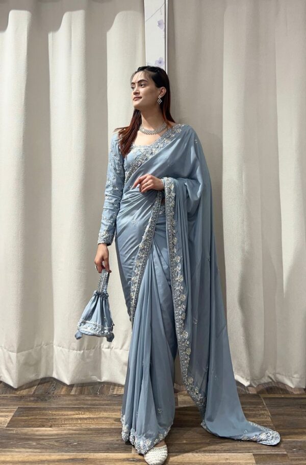 Attractive Beige Rangoli Silk Saree With Comely Blouse